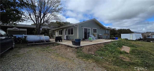 rear view of house featuring a patio area