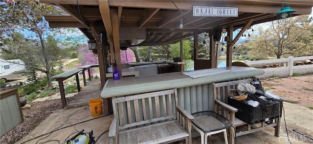 view of patio featuring fence