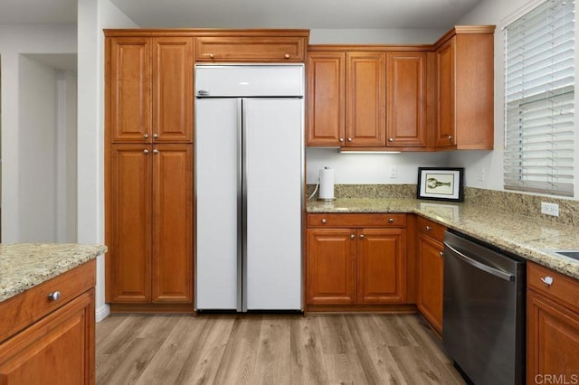 4918 Paramount Dr, San Diego, CA 92123 - kitchen featuring built in fridge, dishwasher, light wood-type flooring, and light stone countertops