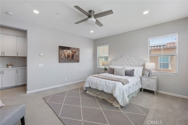 4530 E Langdon Dr, Anaheim Hills, CA 92807 - bedroom featuring light colored carpet, multiple windows, baseboards, recessed lighting, and a ceiling fan