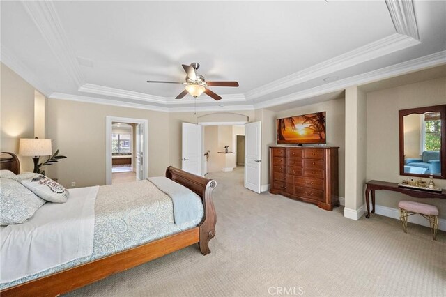 23478 Ridgeway, Mission Viejo, CA 92692 - bedroom with a raised ceiling, ornamental molding, light colored carpet, baseboards, and a ceiling fan