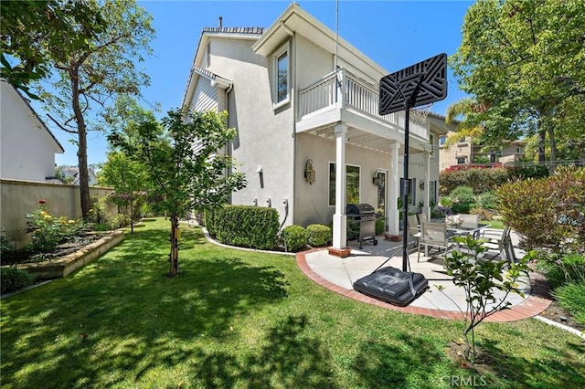 23478 Ridgeway, Mission Viejo, CA 92692 - back of house featuring a balcony, a patio area, and stucco siding
