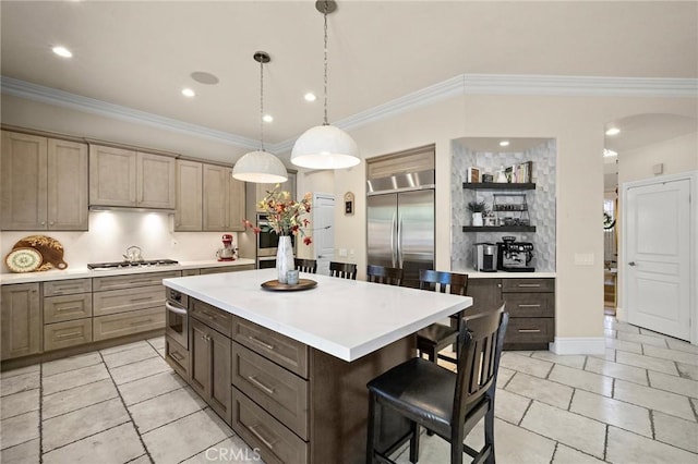 23478 Ridgeway, Mission Viejo, CA 92692 - kitchen with stainless steel appliances, light countertops, light tile patterned floors, arched walkways, and crown molding