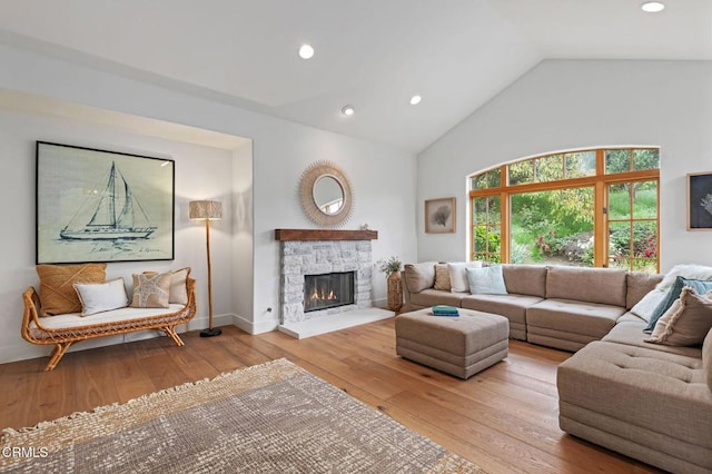 101 Via Tusa, Santa Barbara, CA 93105 - living area featuring hardwood / wood-style floors, high vaulted ceiling, a fireplace, and recessed lighting