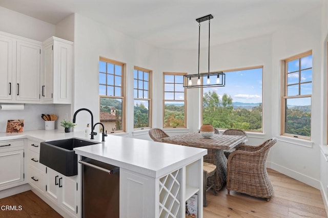 101 Via Tusa, Santa Barbara, CA 93105 - kitchen with a sink, a peninsula, dishwasher, and healthy amount of natural light