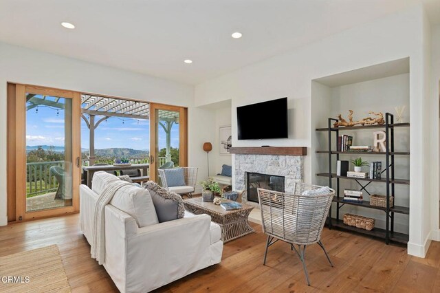 101 Via Tusa, Santa Barbara, CA 93105 - living area with a fireplace, hardwood / wood-style floors, and recessed lighting