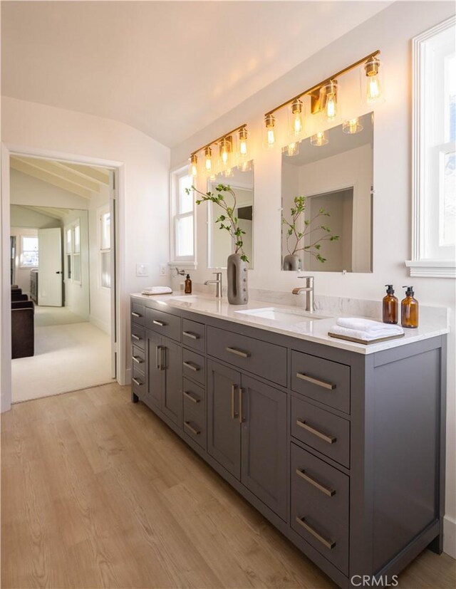 1436 W Bay Ave, Newport Beach, CA 92661 - full bathroom with wood finished floors and double vanity