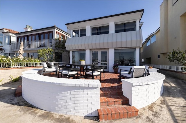 1436 W Bay Ave, Newport Beach, CA 92661 - view of patio / terrace featuring french doors and outdoor dining space