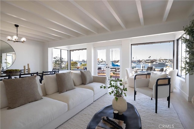 1436 W Bay Ave, Newport Beach, CA 92661 - living room with beamed ceiling, a chandelier, and wood finished floors
