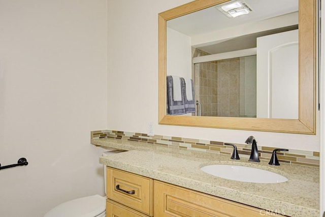 829 Via Alhambra Unit A, Laguna Woods, CA 92637 - full bathroom featuring vanity, toilet, and a tile shower