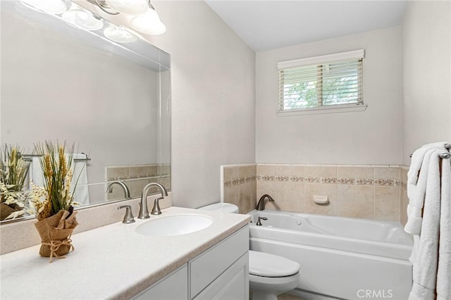 5456 Edith Ave, Corning, CA 96021 - bathroom featuring a garden tub, vanity, and toilet