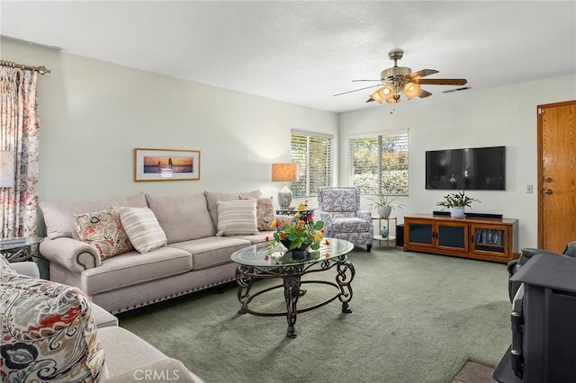 5456 Edith Ave, Corning, CA 96021 - living area featuring carpet floors and a ceiling fan