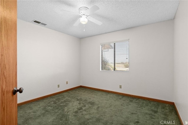 5456 Edith Ave, Corning, CA 96021 - spare room featuring carpet floors, a ceiling fan, a textured ceiling, and baseboards