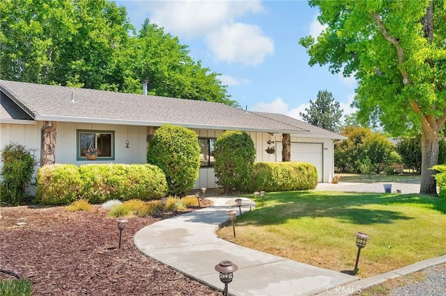 5456 Edith Ave, Corning, CA 96021 - ranch-style house featuring a garage, a front yard, and roof with shingles