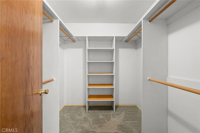 5456 Edith Ave, Corning, CA 96021 - walk in closet featuring carpet