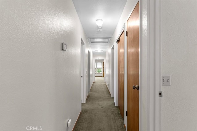 5456 Edith Ave, Corning, CA 96021 - hallway featuring carpet floors and a textured wall