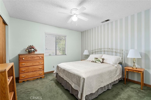 5456 Edith Ave, Corning, CA 96021 - bedroom featuring carpet, baseboards, a closet, ceiling fan, and wallpapered walls