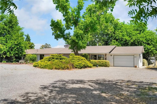 5456 Edith Ave, Corning, CA 96021 - ranch-style home with an attached garage and driveway