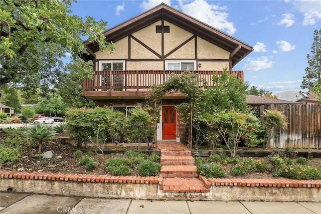 88 Auburn Ave, Sierra Madre, CA 91024 - tudor-style house with stucco siding and a deck