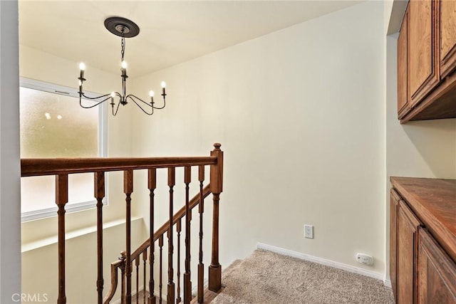 88 Auburn Ave, Sierra Madre, CA 91024 - stairway featuring carpet and a chandelier