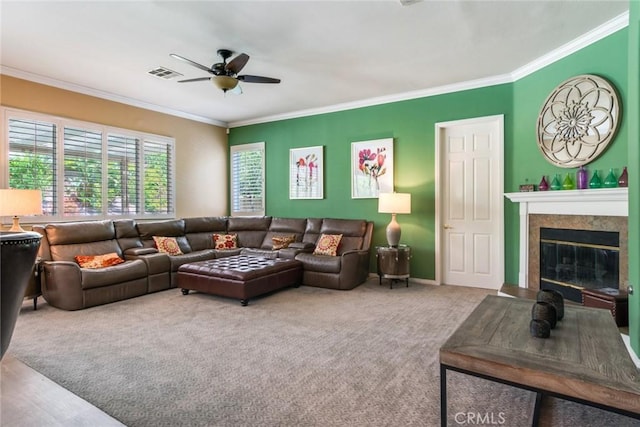 5799 Buckthorn Ave, Rancho Cucamonga, CA 91737 - living room with ceiling fan, crown molding, a fireplace, and carpet floors
