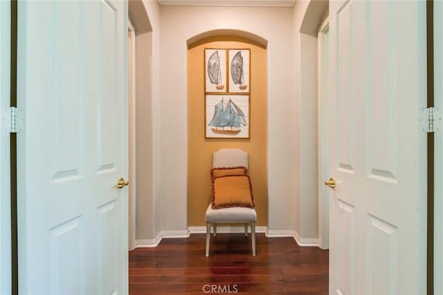 5799 Buckthorn Ave, Rancho Cucamonga, CA 91737 - living area with dark wood-style floors, baseboards, and arched walkways