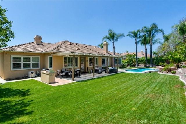 5799 Buckthorn Ave, Rancho Cucamonga, CA 91737 - rear view of house with a tiled roof, an outdoor hangout area, a yard, and stucco siding