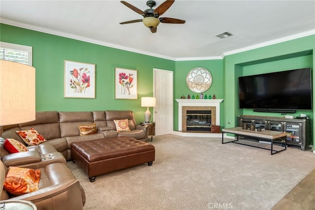 5799 Buckthorn Ave, Rancho Cucamonga, CA 91737 - living room featuring crown molding, a ceiling fan, and a glass covered fireplace