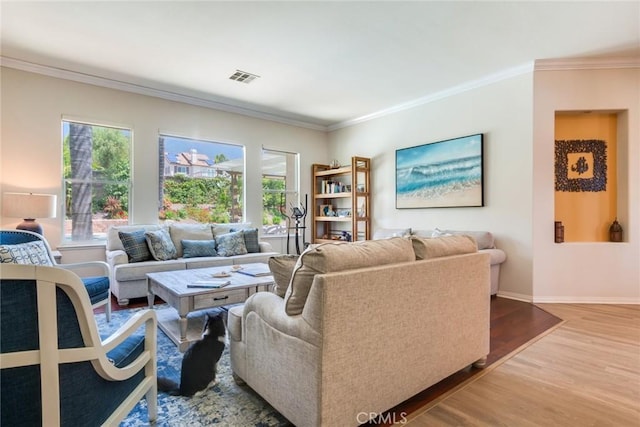 5799 Buckthorn Ave, Rancho Cucamonga, CA 91737 - living area featuring wood finished floors, ornamental molding, and baseboards
