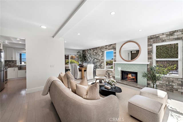 2 Hyannis, Laguna Niguel, CA 92677 - living area with recessed lighting, wood finished floors, and a glass covered fireplace