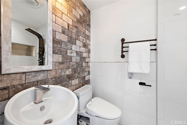 2 Hyannis, Laguna Niguel, CA 92677 - bathroom featuring a sink, tile walls, and toilet