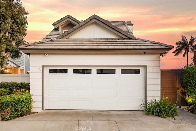 2 Hyannis, Laguna Niguel, CA 92677 - garage at dusk with driveway and fence