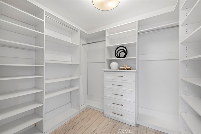 2 Hyannis, Laguna Niguel, CA 92677 - walk in closet featuring light wood-style floors