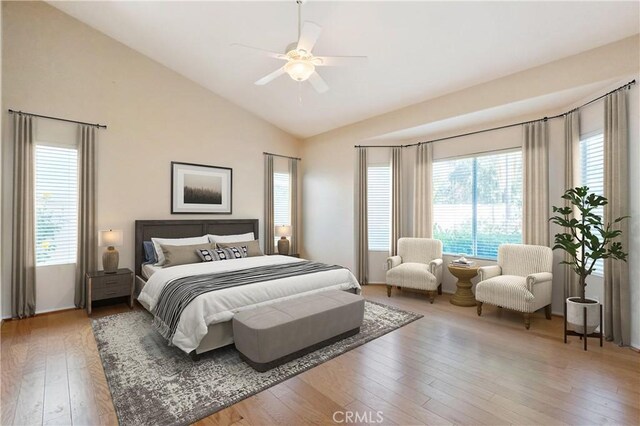 32364 Corte Coronado, Temecula, CA 92592 - bedroom featuring multiple windows, hardwood / wood-style floors, ceiling fan, and high vaulted ceiling