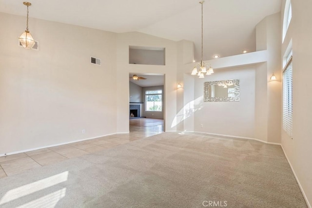 32364 Corte Coronado, Temecula, CA 92592 - unfurnished dining area with high vaulted ceiling, carpet, tile patterned floors, baseboards, and a ceiling fan