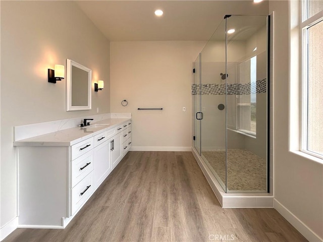 12460 San Marcos Rd, Atascadero, CA 93422 - full bathroom featuring wood finished floors, vanity, a shower stall, and recessed lighting