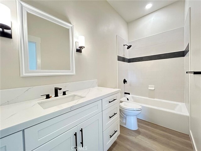 12460 San Marcos Rd, Atascadero, CA 93422 - bathroom featuring wood finished floors, vanity, and shower / washtub combination