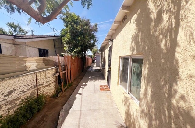 1324 Murdock St, Bakersfield, CA 93307 - view of home's exterior with stucco siding and fence