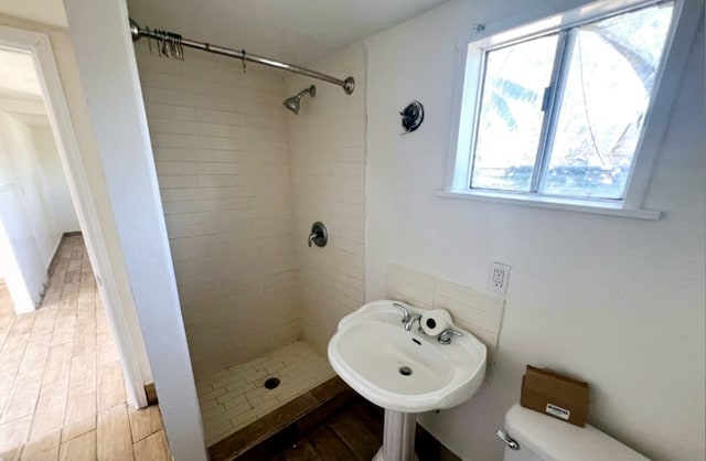 1324 Murdock St, Bakersfield, CA 93307 - bathroom featuring toilet, a stall shower, and a sink