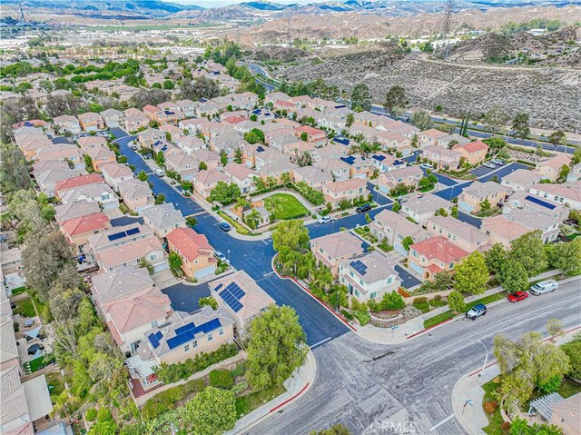 24472 Montevista Cir, Valencia, CA 91354 - aerial view of residential area featuring a mountainous background