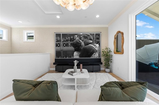 cinema featuring ornamental molding, recessed lighting, and baseboards