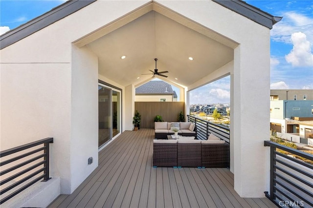 deck featuring an outdoor hangout area and a ceiling fan