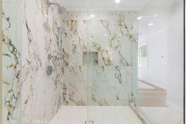 bathroom with a marble finish shower, baseboards, recessed lighting, ornamental molding, and marble finish flooring