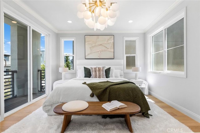 bedroom featuring crown molding, access to exterior, light wood-style floors, baseboards, and a chandelier