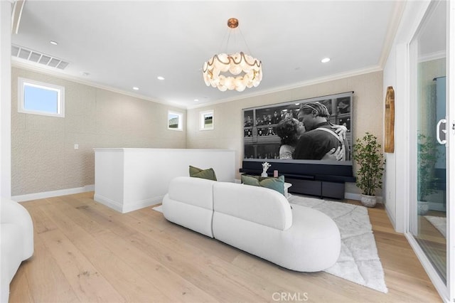 living room featuring crown molding, wood finished floors, a chandelier, baseboards, and recessed lighting