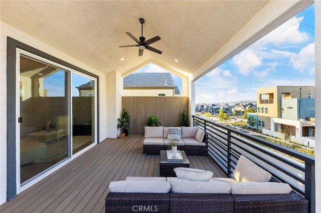 balcony featuring an outdoor hangout area and a ceiling fan