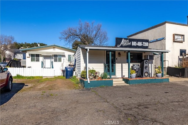 7405 El Camino Real, Atascadero, CA 93422 - view of front facade with a porch and fence