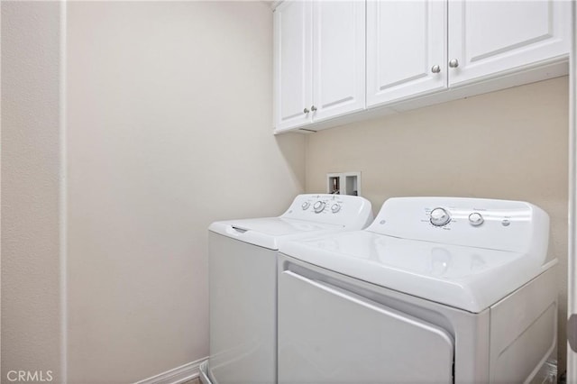 8029 Spencer St, Chino, CA 91708 - laundry area featuring washing machine and clothes dryer and cabinet space