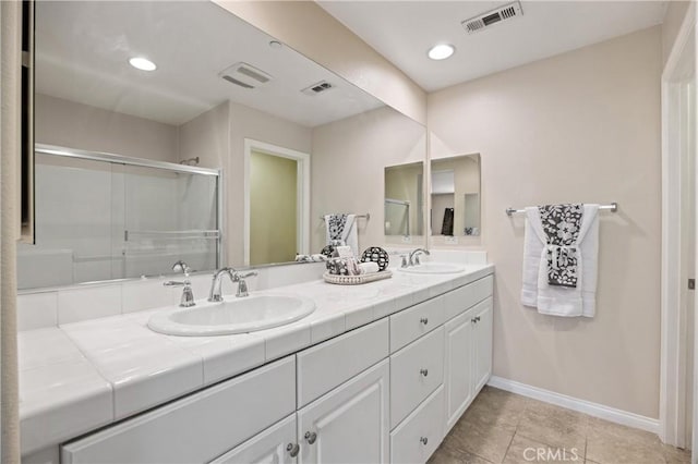 8029 Spencer St, Chino, CA 91708 - full bathroom with double vanity, baseboards, a stall shower, tile patterned floors, and recessed lighting