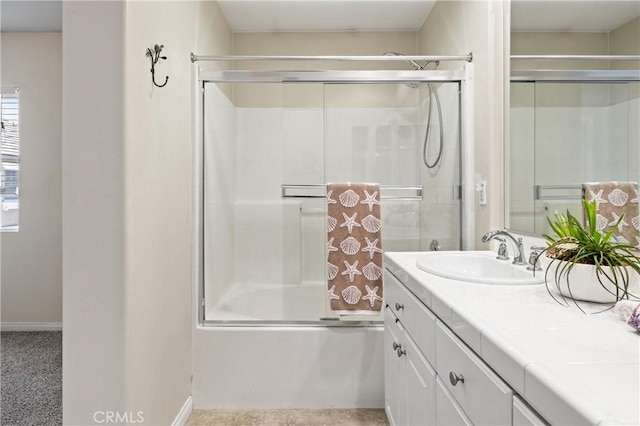 8029 Spencer St, Chino, CA 91708 - bathroom featuring vanity, combined bath / shower with glass door, and baseboards